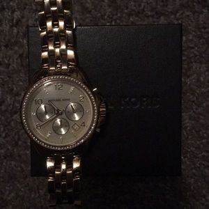 woman’s michael kors gold watch